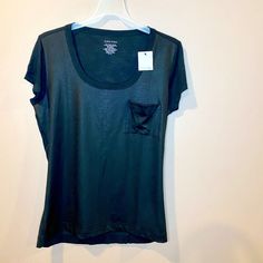 Calvin Klein Black T-Shirt, Front Panel And Pocket. Short Sleeve, Size L Brand New With Tag. 95%Polyester 5%Spandex 100%Rayon Calvin Klein Basic Short Sleeve Tops, Calvin Klein Everyday Summer Tops, Calvin Klein Tops For Everyday Summer Wear, Calvin Klein Stretch Crew Neck Top, Fitted Calvin Klein Casual T-shirt, Calvin Klein Solid Tops For Summer, Fitted Calvin Klein Athleisure Tops, Calvin Klein Summer Tops, Calvin Klein Sporty Stretch Top