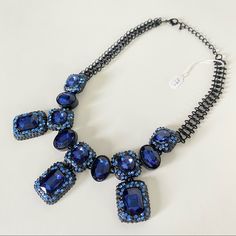 New Blue Stones Black Chain Statement Necklace Costume Jewelry One Size See Photos For Measurements. Such A Pretty Necklace, Perfect For A Gift For You Or A Loved One. Comes With Organza Bag. Thank You For Checking Out My Poshmark Closet. I Have Lots Of Other Pieces Of Jewelry And Accessories! Bundle To Save On Shipping And Get An Additional Personal Discount. Please Feel Free To Ask Questions! Blue Costume Jewelry Necklace With Chain, Blue Chain Costume Jewelry, Blue Costume Jewelry With Chain, Formal Blue Metal Necklace, Blue Costume Jewelry Necklace For Party, Blue Metal Necklaces With Jewels, Blue Jeweled Metal Necklaces, Blue Rhinestone Necklace For Party, Blue Costume Jewelry Necklaces With Jewels