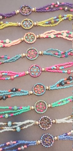 Dreamcatcher glass beaded bracelets please choose from 1-9 * -Handmade - beautiful shine to them Turquoise Friendship Bracelets With Colorful Beads For Festivals, Bohemian Beaded Crystal Bracelet For Friendship, Pink Bohemian Beaded Bracelets For Festivals, Bohemian Tiny Beads Friendship Bracelets For Festivals, Bohemian Friendship Bracelets With Tiny Beads For Festivals, Bohemian Multicolor Crystal Bracelet With Tiny Beads, Bohemian Beaded Crystal Bracelet For Festivals, Bohemian Beaded Crystal Festival Bracelet, Pink Bohemian Crystal Bracelet For Friendship