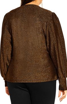 A shimmery knit fabric adds a pop of glamour to this surplice V-neck top framed by billowy long sleeves. 26" length (size X-Small) Surplice V-neck Long sleeves Lined 58% nylon, 34% metallic fibers, 8% elastane Hand wash, dry flat Imported Glamorous V-neck Winter Top, Gold V-neck Top For Fall, Chic Long Sleeve Glitter Tops, Shimmer Long Sleeve Blouse For Night Out, Long Sleeve Shimmer Blouse For Night Out, Chic Shimmer Top For Fall, Chic Shimmer Tops For Fall, Metallic Long Sleeve Holiday Tops, Holiday Metallic Long Sleeve Tops