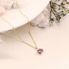 Your Purple Gemstone Botanical Pendant is stylish, dainty and pretty ideal for everyday use. Details of solid gold handmade Dainty Marquise Necklace are very eye-catching. It is a great gift for your loved ones. This jewelry will be an indispensable piece of yours. This meaningful February Birthstone Necklace with high quality handwork will be a legacy you can leave to your family its.  * Marquise Amethyst Necklace Details * Material / Gold Kt : This dainty necklace is made of 14k and 18k Solid Gold * Available Gold Colors : Yellow Gold, White Gold, Rose Gold * Chain Length Options :  - 14 Inches - 35,56 cm - 15 Inches - 38,10 cm - 16 Inches - 40,64 cm - 17 Inches - 43,18 cm - 18 Inches - 45,72 cm - 19 Inches - 48,26 cm - 20 Inches - 50,80 cm - 21 Inches - 53,34 cm - 22 Inches - 55,88 cm * Dainty Purple Necklace As Gift For Her, Purple Dainty Necklace As Gift For Her, Purple Dainty Necklace For Her, Dainty Purple Pendant Necklace, Dainty Flower Pendant Birthstone Necklace, Delicate Pendant Birthstone Necklace For Jewelry Making, Delicate Birthstone Pendant Necklace For Jewelry Making, Dainty Purple Gemstone Necklace, Flower Pendant Gemstone Necklace