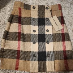 So Beautiful, So Mint. Beautifully Lined. Tags Attached, Extra Button In Little Burberry Plastic Bag. It Got Lost In My Closet, Can You Believe That! So Many Items With Tags Attached. Wonder If This Is Vintage, I'll Find Receipt. Navy Mini Skirt, Burberry Skirt, Check Mini Skirt, Burberry Plaid, Burberry Classic, Plaid Baby, Scottish Kilts, Wool Mini Skirt, Diy Clothes Life Hacks