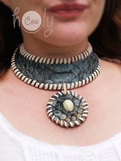 This beautiful handmade leather necklace is made from the finest quality blue snake print leather. It has beautiful sea shell incorporated into it's design. This hippie necklace is adjustable at the back so it fits all sizes. Handmade Leather Necklaces, Medieval Necklace, Pagan Necklace, Necklace Shell, Blue Snake, Necklace Leather, Hippie Necklace, Beautiful Sea, Shell Necklace