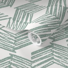 an abstract wallpaper with green and white designs on it's sides, including a ring in the middle