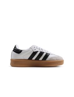 Born on the pitch, the Samba is a timeless icon of street style. This silhouette stays true to its legacy with a tasteful, low-profile, soft leather upper, suede overlays and gum sole, making it a staple in everyone's closet - on and off the pitch. Adidas Sneakers With Contrasting Heel Counter For Streetwear, Adidas Sneakers With Rubber Heel Cap, Adidas Leather Skate Shoes With Branded Insole, Adidas Sporty Sneakers With Leather Sole, Adidas Skate Shoes With Contrast Sole And Round Toe, Adidas Skate Shoes With Contrast Sole, Adidas Skate Shoes With Gum Sole And Round Toe, Adidas Leather Skate Shoes With Round Toe, Adidas Leather Skateboarding Sneakers