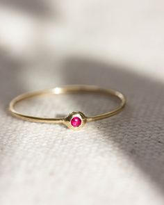 Delicate stacking ring made with strong work-hardened band, 19g. 2mm stone of choice Bezel setting In-stock items ship in 1-3 days. Made-to-order [MTO] items ship in 1-3 weeks.