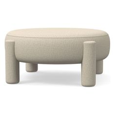 a round ottoman with two legs and a foot rest on the bottom, in beige fabric