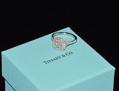 a tiffany & co ring in a blue box