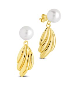 Indulge in luxury with our Chérie Drop Studs. These elegant earrings feature lustrous pearls, hand-selected for their exquisite beauty. The delicate drop design adds a touch of sophistication to any outfit, making these studs the perfect statement piece for any occasion. Material: 14K gold or rhodium plated brass, shell pearls Features: 1.25" drop, 0.3" stud, 0.95" charm, 9mm pearls, Lead & Nickel free, post back Drop Pearl Earrings For Evening, Elegant Pearl White Earrings With Pearl Chain, Elegant Pearl White Earrings With Pearl Drop, Elegant Pearl White Pearl Chain Earrings, Elegant Pearl White Pearl Drop Earrings, Elegant Pearl Pendant Earrings For Party, Elegant Pearl Drop Earrings For Evening, Elegant Yellow Gold Teardrop Earrings With Pearl Drop, Elegant Gold Teardrop Earrings For Evening