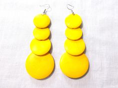 NEW REAL WOODEN DANGLING BOHEMIAN STYLE EARRINGS LARGE AND LONG SIZE - REAL WOOD - GRADUATING 4 TIER - BRIGHT CANARY YELLOW DOUBLE SIDED COLORS - ROUND SHAPE WOOD EARRINGS Each measures approx 3.5 inches long & 1 1/2 across and dandle to about 4 inches overall Jewelry for pierced ears - fish hook wires Please ask any questions before buying Fashion fun wooden jewelry or earrings. Wooden Fashion, Canary Yellow, Earrings Large, Large Earrings, Wood Earrings, Wooden Jewelry, Style Earrings, Fish Hook, Pierced Ears