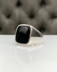 Men Ring with Onyx, Black Pinky Signet Ring, Square Shape Genuine Gemstone, Stylish Gold / Silver Ring, Handmade Jewelry, Best Gift for Him ◎ Details ◎ ○ Material 14K Solid Gold or 925 Sterling Silver Weight of Ring : approx 18.00 gr Height of Ring : approx 5.30 mm ○ Upgrade to Solid 18K Gold, please click the link below: https://www.etsy.com/listing/962826004 ○ Gemstone Natural Onyx Gemstone approx. 15 mm x 15 mm 4.23 ct Made to Order HANDMADE ITEM ○ For Men Collection : https://etsy.me/2PmKJMW Modern Onyx Signet Ring For Gift, Modern Onyx Signet Ring Gift, Classic Black Rings With Polished Edges, Classic Onyx Rings For Promise, Formal Onyx Rings With Polished Finish, Classic Onyx Promise Ring, Timeless Jewelry Ring With Large Stone, Timeless Jewelry With Large Stone, Classic Large Stone Promise Ring