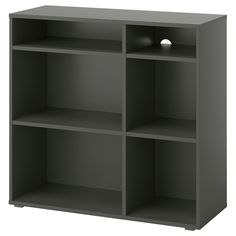 an empty shelf with two lights on each side and one light in the middle,