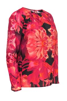 Go for a feminine floral top today with this Ted Baker blouse! Perfect for the office, cocktail hour and so much more! Made with a pleated neckline, this is a versatile polished piece to wear with everything and anything! Size 6 (Ted Baker size 2) 100% Polyester Relaxed silhouette Rounded neckline with pleats Long sleeve Waist 34" Total length 24" Formal Printed Tops For Spring, Spring Silk Tops With Floral Print, Spring Formal Printed Tops, Formal Silk Blouse With Print, Formal Silk Blouse With Printed Details, Formal Silk Printed Blouse, Silk Floral Print Top For Work, Formal Silk Printed Tops, Formal Printed Silk Tops