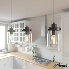 Subtle rustic detailing perfect for farmhouse spaces. Ball jar inspired glass shades on the Devon Park 3-light linear cluster light complete the look of coastal and farmhouse style spaces. Tailor the look for your space by varying the height of the mini pendant lights to fit your needs and style. Hunter Devon Park 3-Light Onyx Bengal Farmhouse Clear Glass Jar LED Large Hanging Kitchen Island Light | 19155 Lights Over Island, Lights Over Kitchen Island, Edison Light, Ball Jar, Farmhouse Light Fixtures, Linear Pendant Light, Kitchen Island Linear Pendant, Light Kitchen Island, Ceiling Fan Design