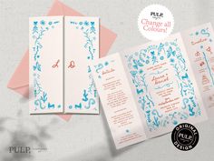 the wedding stationery is designed with blue and pink flowers on it, along with matching envelopes