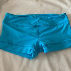 Nwt California Kisses Turquoise Bootie Shorts In Juniors Size S Blue Summer Swimming Shorts, Shorts With Built-in Shorts For Playwear, Fitted Bottoms For Playwear, Blue Short Leg Swim Trunks For Beach, Blue Stretch Swim Trunks For Workout, Blue Stretch Beach Shorts, Blue Poolside Shorts With Elastic Waistband, Stretch Blue Beach Shorts, Blue Swimwear With Built-in Shorts