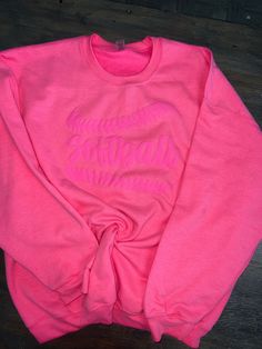 Softball neon pink puff on neon pink sweatshirt Pink Sweatshirt With Ribbed Cuffs And Crew Neck, Pink Crew Neck Sweatshirt With Ribbed Cuffs, Pink Relaxed Fit Varsity Sweatshirt, Pink Spring College Sweatshirt, Pink Spring Sweatshirt For College, Pink Sweatshirt For College In Spring, Pink Spring Tops With Ribbed Cuffs, Pink Cotton Sweatshirt For College, Pink Winter Tops For College