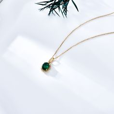 Our exquisite 18K Gold Pendant Necklace, adorned with a stunning ovalshaped emerald, is designed to bring timeless elegance and sophistication to any womans jewelry collection. Expertly crafted from premium 18K gold, this pendant necklace features a captivating ovalshaped emerald that radiates luxury and charm. The rich green hue of the emerald contrasts beautifully with the lustrous gold setting, creating a piece that is as durable as it is stunning. Perfect for special occasions or everyday wear, this necklace will be a cherished addition to any wardrobe. Elegant Gold Emerald Necklace With Round Pendant, Exquisite Emerald Necklace For Formal Occasions - May Birthstone, Exquisite Emerald Necklace For Formal Occasions And May Birthstone, Luxury Green Oval Necklace, Exquisite Formal Emerald Necklace For May Birthstone, Luxury Oval Emerald Necklace, Exquisite Oval Green Emerald Necklace, Elegant Oval Emerald Necklace In Yellow Gold, Exquisite Green Oval Emerald Necklace