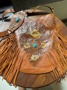 Tan fringe bag  Hand tooled  Boho style 29 cm x 34 cm. Bohemian Leather Fringe Satchel, Artisan Brown Bag With Fringe, Brown Artisan Bags With Fringe, Artisan Brown Bags With Fringe, Artisan Brown Fringe Bag, Artisan Leather Shoulder Bag With Fringe, Vintage Leather Bags With Fringe, Brown Bohemian Satchel With Fringe, Artisan Rectangular Shoulder Bag With Fringe