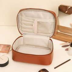 Large Capacity Travel Cosmetic Bag,Travel Makeup Bag Leather With Brushes Slots Divider Flat Lay Cosmetic Bag Portable Makeup Organizer Features: Quantity: 1pc Material: polyurethane Color: White,Black,P-ink,Brown Product size: 24x17x11cm /9.45x6.7x4.33in Packing size: 28x18x4cm /11.02x7.08x1.57in Gross weight: 213g/0.46lb Applicable scene: Outdoor, Travel Product Description: Material and SizeOur travel makeup bag is made of premium soft and comfortable leather,strong, and and easy to clean. 9. Faux Leather Rectangular Box Bag For Travel, Large Capacity Rectangular Travel Cosmetic Bag, Large Capacity Rectangular Travel Cosmetic Storage, Large Capacity Rectangular Cosmetic Storage For Travel, Large Capacity Rectangular Cosmetic And Toiletry Storage For Travel, Large Capacity Rectangular Cosmetic And Toiletry Storage, Rectangular Cosmetic And Toiletry Storage With Large Capacity, Brown Portable Rectangular Cosmetic Bag, Large Capacity Rectangular Cosmetic Bag