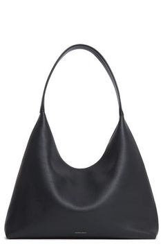 Slouchy and spacious, this oversized hobo bag is made in Italy from soft, grained leather with a supple suede lining and simple shoulder strap. Top zip closure Shoulder strap Calfskin-suede lining Leather Made in Italy Designer Handbags Modern Office Hobo Bag With Single Shoulder Strap, Evening Hobo Tote Bag In Soft Leather, Chic Smooth Grain Hobo Bag For Daily Use, Chic Textured Leather Hobo Bag With Double Handle, Chic Hobo Bag With Smooth Grain For Shopping, Evening Soft Leather Hobo Bag With Double Handle, Evening Soft Leather Hobo Tote Bag, Leather Hobo Bag With Single Shoulder Strap For Office, Chic Smooth Grain Hobo Bag For Shopping