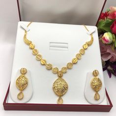 Handmade Indian Bridal Wedding Jewelry 22ct Heavy Gold Plated Necklace Set with Earrings Indian Jewelry Indian Bollywood Jewelry , its Artificial Jewelry  Type :22ct Gold Plated Necklace Set Earrings Length: 2"inches Approx Shape - As Shown in Picture It is a perfect match with formal attire on special occasions or with casual wearing  Jewellery Gift Box is not includ Traditional Indian Wedding Jewellery Slight Colour variations possible due to difference in screen and photograph Care instructio Gold Diamond Cut Necklace For Wedding, Gold Plated Necklaces For Marriage, Gold Plated Jewelry Sets For Marriage, Formal Gold Bridal Necklace With Diamond Cut, Gold Jewelry Sets Diamond Cut Gift, Gold Diamond Cut Jewelry Sets As Gift, Gold Diamond Cut Jewelry Sets For Gifts, Gold Diamond-cut Jewelry Sets For Wedding, Gold Diamond Cut Jewelry Sets For Wedding