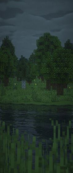 an animated image of trees and grass by the water