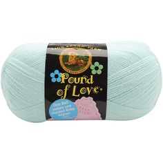 a ball of yarn with the words pound of love written on it in blue and pink