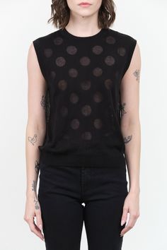 The Mael Shell is a sleeveless knit tank top, featuring a delicate polka dot pattern. Made from a blend of tencel and cashmere, this top offers a soft and semi-sheer texture that exudes luxury. Perfect for layering or wearing on its own, this black tank top with sheer circles is a unique piece that will effortlessly elevate any outfit. Sheer Texture, Tassel Scarf, Sleeveless Knit, Knit Tank Top, Skirt Jumpsuit, Black Tank Top, Rachel Comey, Knit Tank, Knit Tees