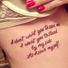 a woman's back with a tattoo saying i don't want you to save me