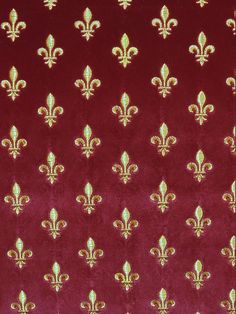 a red background with gold fleur de lis on it