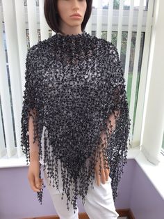 "This glamorous black shawl is so very smart, with its sparkly silver glitz threads, a sure winner for a party, smart event, black tie do, or a special occasion of any kind. A really lovely, unique gift for any fashionista, too! It really is something special for any lady, & a bespoke accessory at an affordable price. A superb item to wear. 95% polyester, 5% metallic lurex Hand wash, or machine wash on gentle. Dry flat or gentle tumble dry. Approx size- from top to point, 61cm (24\") x 164cm (64\") across, at its widest point I have been established for several years, & have won awards for my scarves, as they are so versatile & easy to wear, as are the shawls, which have evolved as a result of customer requests, & are proving to be equally as popular. I have also been interviewed on local Elegant Black Evening Shawl, Black Winter Evening Shawl, Black Evening Shawl For Winter, Silver Formal Shawl, Lady A, Black Shawl, Nose Work, Black Tie Event, Black And Silver