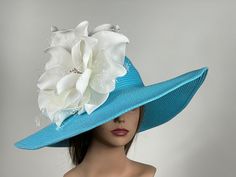 "Vogue hats are perfect for horse racing events, church, the Kentucky derby, weddings, garden tea parties and charity events. 100% Brand new, hand made and high quality. One size hat.(20\" - 22.\") Flower is approx. 13\" Made from foam Brim is approx. 6\" Please feel free to ask me any questions or special requests. Please visit my other shop https://www.etsy.com/shop/BridalWorldAccessory Thank you for visiting my shop." Turquoise Hat For Kentucky Derby Races, Light Blue Mini Hats For Kentucky Derby, Light Blue Summer Hats For Races, Light Blue Summer Hat For Races, Turquoise Mini Hat For Kentucky Derby Races, Blue Summer Hats With Handmade Flowers, Turquoise Hats For Spring Races, Elegant Turquoise Hat For Races, Turquoise Spring Racing Hat