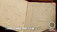 an open book with writing on it and a clock in the background that reads, la agenda de mardeli proust a la bm