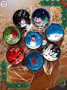 six christmas themed dishes sitting on top of a wooden table