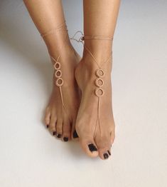 Fast shipping will be made for $ 50 shopping. It will reach you in 7 days. please browse my shop: https://www.etsy.com/shop/MiaJewelryStudio ready to ship. It's easy and beautiful summer jewelry for the feet. They look very elegant on your feet and high light the beauty of your ankles. In them you need to pay attention and you'll feel the queen of the beach! It is always a great time to fancy up your feet! Wear Barefoot Sandals on the beach pool, at home, at weddings party or at yoga class. Plea Cheap Open Toe Barefoot Sandals For Women, Adjustable Gold Bohemian Barefoot Sandals, Handmade Barefoot Sandals With Ankle Wrap, Bohemian Gold Barefoot Sandals, Brown Ankle Strap Barefoot Sandals For Festivals, Bohemian Brown Barefoot Sandals With Ankle Strap, Handmade Gold Barefoot Sandals For Summer, Adjustable Gold Ankle Wrap Barefoot Sandals, Adjustable Gold Toe Ring Sandals For Festivals