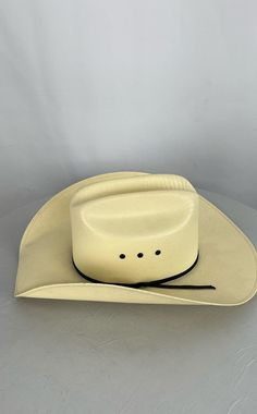 Double SS Cream/Solid Cowboy Hat - Size 7 Brand: Double SS Type: Cowboy HatCondition: Fair - shows sign of wear Size: 7 Color/Pattern: Cream/Solid *Please fully inspect the listing's photographs, item specifics, and description. *Have questions? Ask away, and we will respond as soon as possible! We are always happy to provide additional information and photos. *Change your mind? You can return your item within 30 days for your money back. *We ship using USPS Ground Advantage, USPS Priority Mail, and UPS Ground. Shipping options are selected for each listing based on the size and weight of the packaged item. *Everything we sell is packaged and shipped with love by one of our team members, please note our handling time when completing your purchase and estimating delivery time. *When you pur Best Cowboy Boots, Comic Clothes, Straw Cowboy Hat, Hat Collection, Team Members, Travel Wallets, Cowboy Hat, Hat Sizes, Western Wear