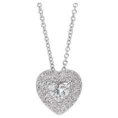 Magnificent 1.01ct Diamonds Double Halo Necklace with Pendant in 18k White Gold - GIA Certified This breathtaking 18k white gold necklace features a captivating 0.71-carat heart-shaped diamond offering impeccable brilliance and rarity. Surrounded by a dazzling double halo of 25 round diamonds totaling 0.30-carat radiating elegance from every angle. Certified by GIA, this piece is the perfect symbol of timeless beauty and luxury. Metal: 18k White Gold Main stone: 1 pc Diamond Main stone carat wei Round Diamond Pendant, Necklace With Pendant, Halo Necklace, White Gold Necklace, Diamond Solitaire Necklace, Halo Pendant, Gold Diamond Necklace, Double Halo, Solitaire Necklaces