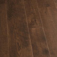 wood flooring with dark brown stain on it