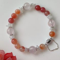 NEXT DAY SHIPPING A chic bracelet is perfect and unique, whether color matching or design. Orange-red agate and pink rose quartz crystals, paired with rough moonstone, make the whole bracelet look very charming and eye-catching, such a lovely gift for friends and family members. Please don't hesitate to contact me with any questions at all. View more items in my shop      https://www.etsy.com/shop/TTanGadgets All images are copyrighted by TTANGADGETS . All rights reserved Rose Quartz Gemstone Beaded Bracelets, Agate Gemstone Beads Crystal Bracelet As Gift, Rose Quartz Beaded Bracelet Gift, Rose Quartz Round Crystal Bracelet Gift, Pink Crystal Bracelet With Natural Rose Quartz, Rose Gold Beaded Bracelets With Natural Stones For Gift, Rose Quartz Gemstone Beaded Bracelets As Gift, Agate Bracelets With Natural Stones As Gift, Rose Quartz Crystal Bracelet With Natural Stones