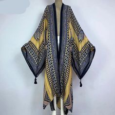 44267544248535 Printed Long Sleeve Kimono For Festival, Bohemian Yellow Long Sleeve Kimono, Bohemian Long Printed Outerwear, Long Sleeve Patterned Kimono For Festival, Bohemian Printed Cardigan For Vacation, Printed Long Sleeve Cardigan For Vacation, Bohemian Patterned Beach Outerwear, Printed Long Kimono For Fall, Long Patterned Printed Kimono