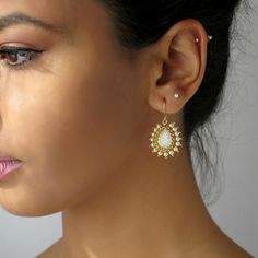 "I created these crystal bridal earrings by hand, using white opal Swarovski teardrop 14*10mm for each one, Swarovski 3mm beads, Miyuki round seed beads, Miyuki Delica beads, and goldfilled 14k ear-wire * Measurements: Earring length: 1.37\" (3.5cm) Teardrop earrings diameter: 0.78\" (2cm) * The earrings will come beautifully packaged for a gift. *Additional information on the matching necklace you can see here: https://www.etsy.com/listing/220798431/pearl-wedding-necklace-pearl-bridal?ref=shop_ Gold Earrings Bridal, Pearl Gold Earrings, Pearl Teardrop Earrings, Teardrop Bridal Earrings, Pearl Bridal Earrings, Swarovski Crystal Drop Earrings, Earrings For Wedding, White Opal Earrings, Earring Pearl