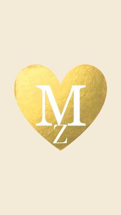 a gold heart with the letter m on it's side, and an i - z