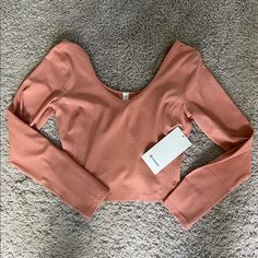 -Size 8 -Pretty Blush/Peach Pink Color -Nwt, I Just Didn’t Like How The Style Looked On Me -Make Offers!! Fitted Pink Activewear With Thumbholes, Pink Workout Tops With Thumbholes, Pink Fall Activewear For Workout, Pink Activewear For Fall Workouts, Pink Fall Workout Activewear, Fitted Pink Top For Pilates, Pink High Stretch Activewear For Fall, Pink Moisture-wicking Tops For Pilates, Align Long Sleeve