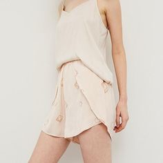 Now tulip shorts are a trend we can get behind! These flowy shorts feel like butter on your skin and are a truly easy yet polished look. Throw on with a cami or over a bodysuit. Color: Petal (light peachy pink) Material: 100% Polyester Care: Do not bleach or iron, Lay flat to dry Tulip Shorts, Flowy Shorts, Peachy Pink