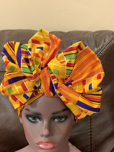 "Elegant Ankara Earrings and Head wrap, made with high quality, 100% African Fabric. Ankara Fabric. Please note that the head wrap is not pre wrapped. The picture is for inspiration only. Head Wrap: Ankara Fabric measures 68'' X 21\" Long Main material : 100% Cotton Fabric For Matching Earrings: Your choice Made in United States Please feel free to contact me if you hope to know any other details. For any question please contact me. Thank you for visiting my shop" Traditional Yellow Adjustable Headwrap, Traditional Adjustable Yellow Headwrap, Handmade Adjustable Headwrap Gift, Traditional Adjustable Multicolor Headwrap, Adjustable Multicolor Traditional Headwrap, Adjustable Multicolor Handmade Headwrap, Adjustable Handmade Multicolor Headwrap, Handmade Multicolor Adjustable Headwrap, Traditional Multicolor Headwrap With Matching Headband