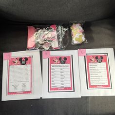 the contents of a minnie mouse birthday party are displayed on a couch with pink and white decorations