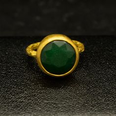 Green Emerald Ring | 24K Gold Plated | Minimalist Jewelry | Statement 925 Sterling Silver Ring | Birthstone Ring | Dainty Ring Our shop offer free ring sizing Handcrafted hammered ring Metal : 925 Sterling Silver Plating : 24K Gold Band Width : 2 mm Gem Stone : Lab Emerald Gem Size : 11 mm Ring Weight : 4.3 grams Ring Size : US 6 (The size you want is made for free). (We used the US standard sizing) **Custom Orders is Made** As pellada family, we will be happy to help you if you contact us with Gold Minimalist Emerald Ring In Sterling Silver, Minimalist Gold Emerald Ring In Sterling Silver, Smaragd Ring, Hammered Jewelry, Green Emerald Ring, Emerald Gem, Hammered Ring, Zierlicher Ring, Hammered Rings