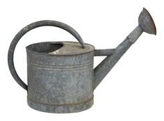 an old metal watering can with a handle