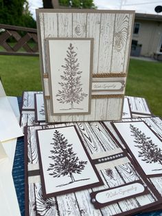 a table topped with lots of cards and envelopes